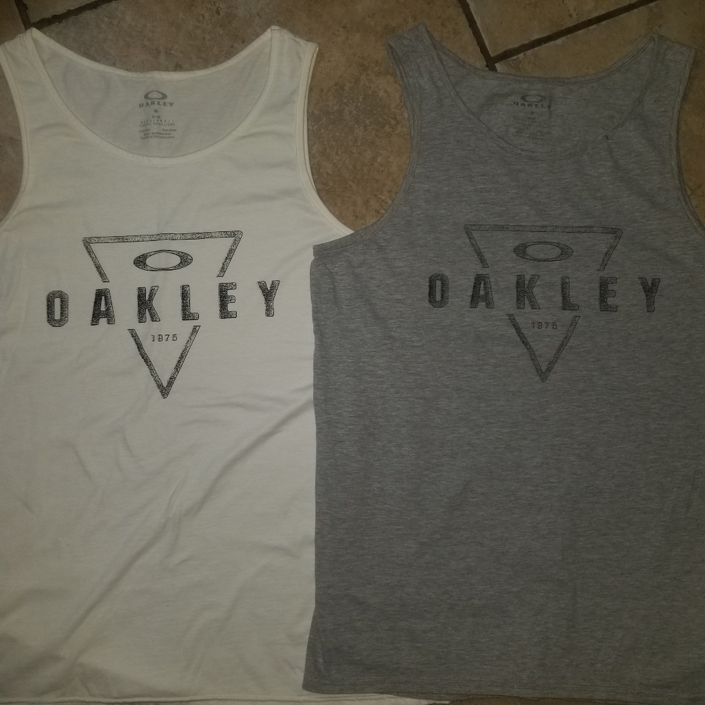 Two Oakley shirts